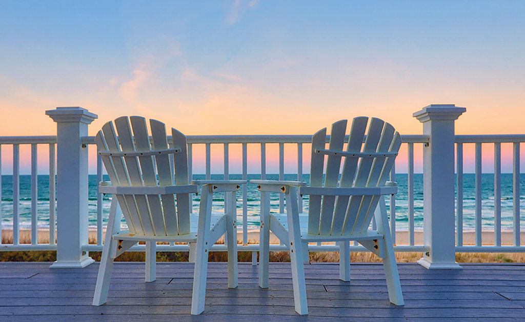 two chairs on deck beach view