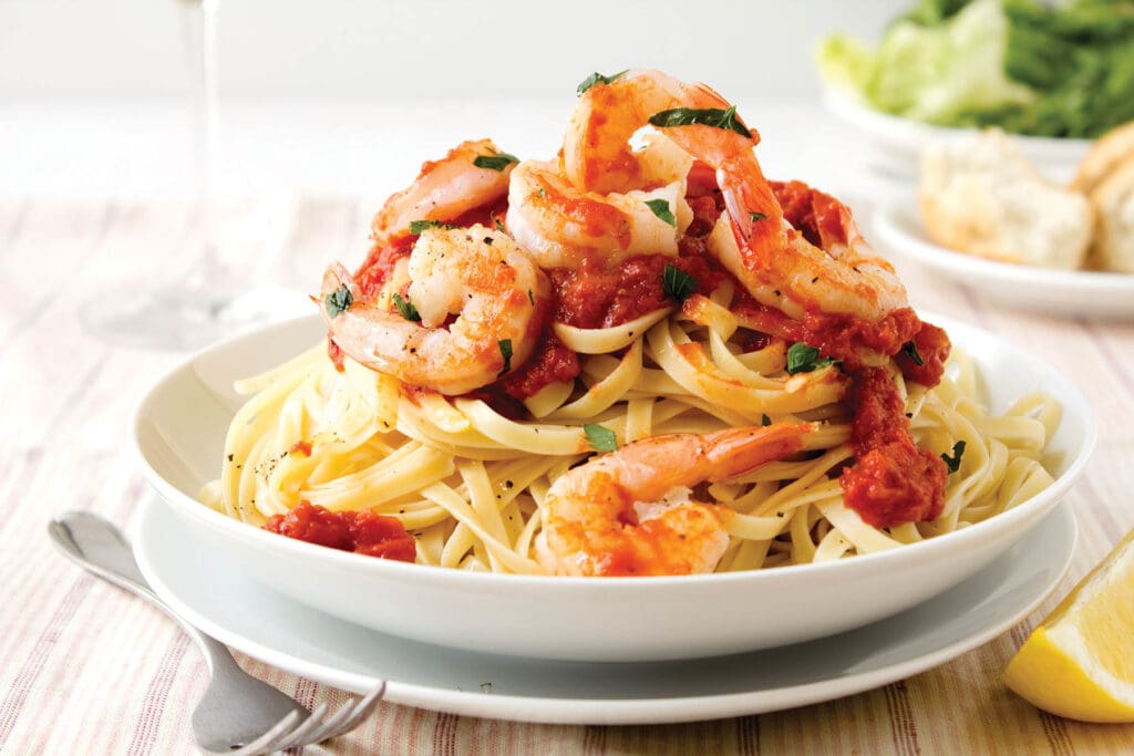 Fresh linguine with king prawns and a tomato and herb sauce.More great images in my food and drink lightbox...