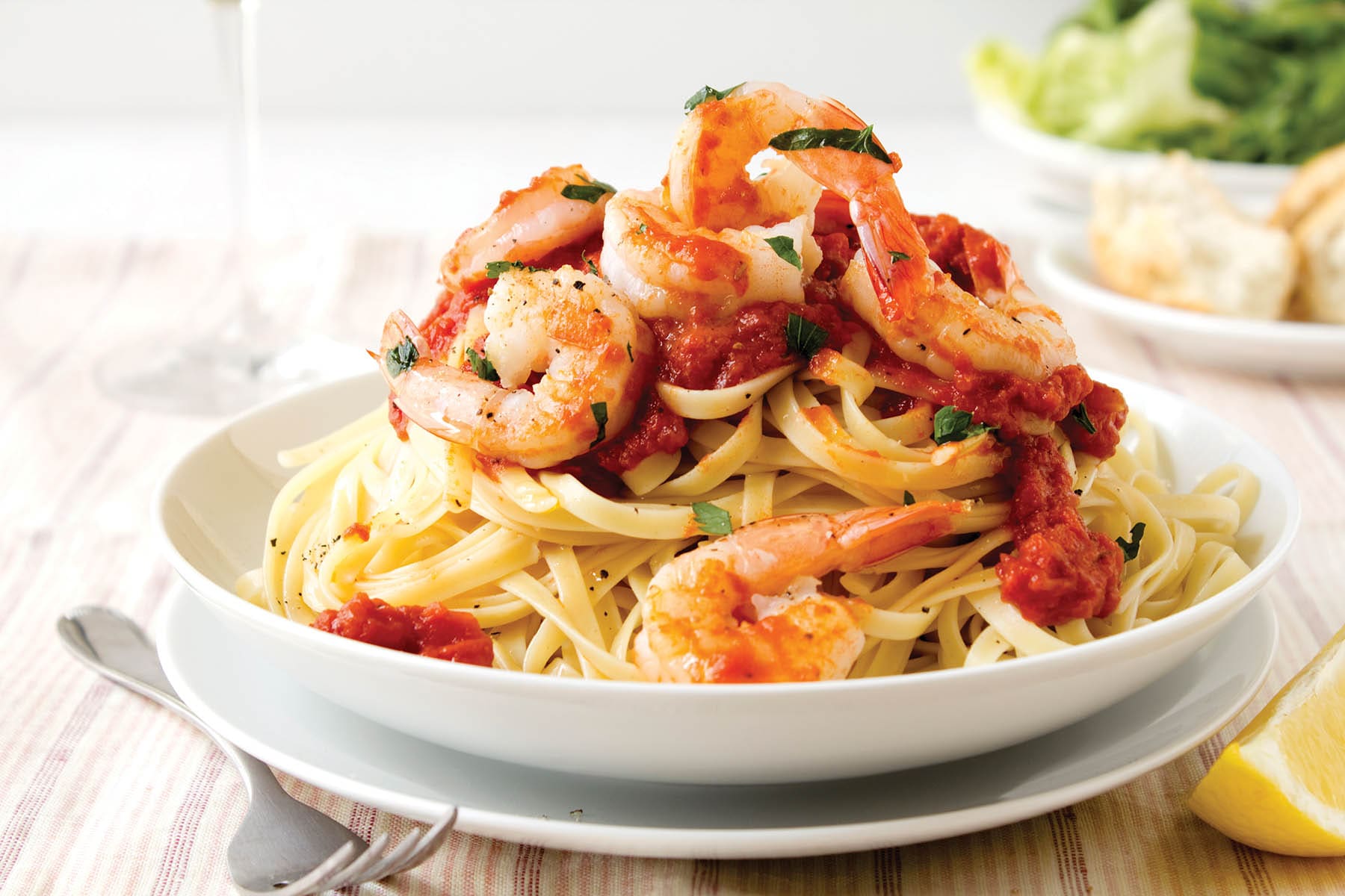 Fresh linguine with king prawns and a tomato and herb sauce.More great images in my food and drink lightbox...